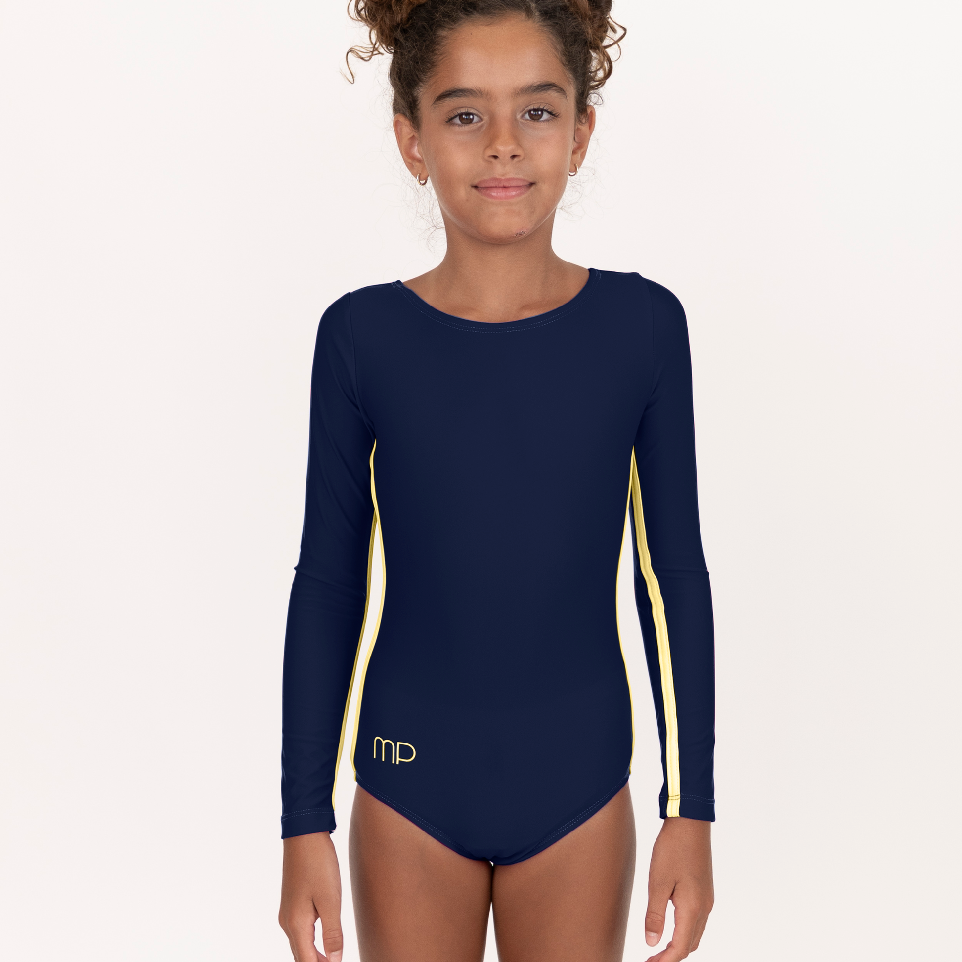 Athlete wearing a dark blue long-sleeve leotard with a butter-yellow underarm stripe, front view.